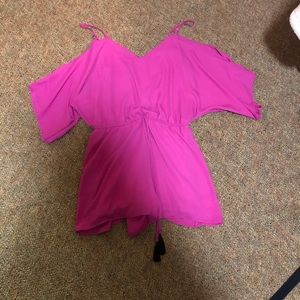 Never worn bright pink romper. Size medium.